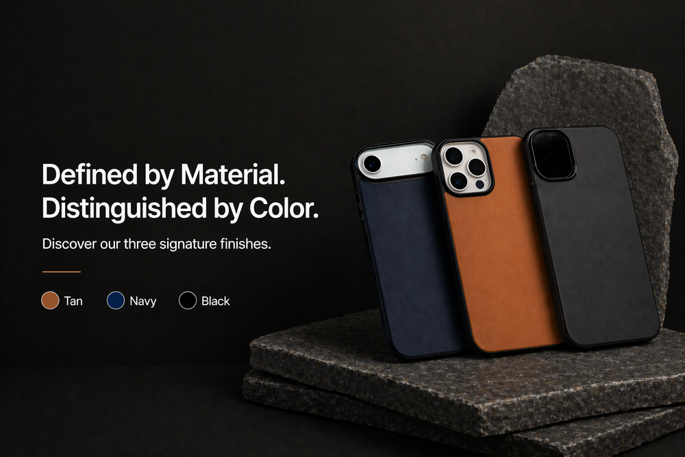 Three Crazy Horse leather phone cases in tan, navy, and black on a textured surface.