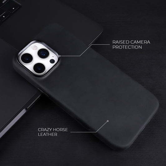 Black Crazy Horse full leather cover for iPhone 16 Pro Max and 16 Pro, on a dark desk