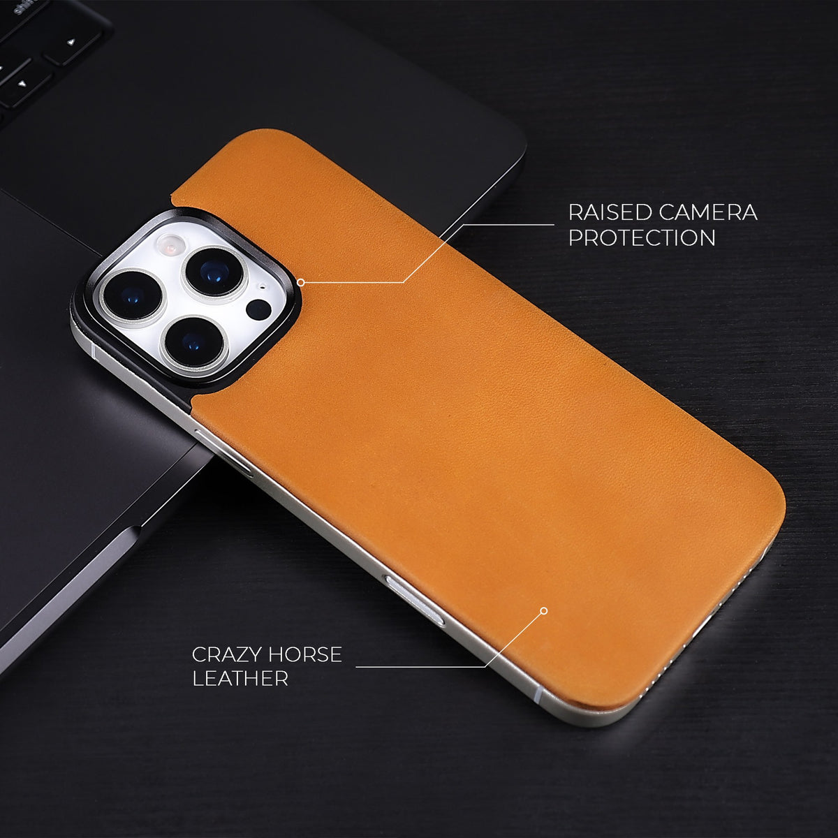 Tan Crazy Horse magnetic leather back for iPhone 16 Pro Max and 16 Pro, on a dark desk