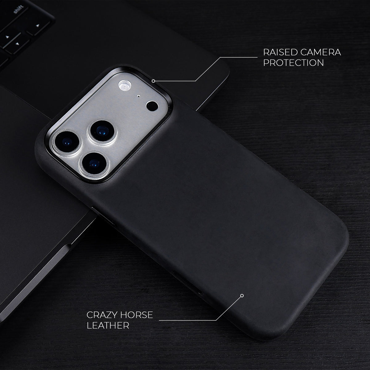 Black Crazy Horse full leather cover for iPhone 17 Pro Max, 17 Pro, 18 Pro Max and 18 Pro, on a dark desk