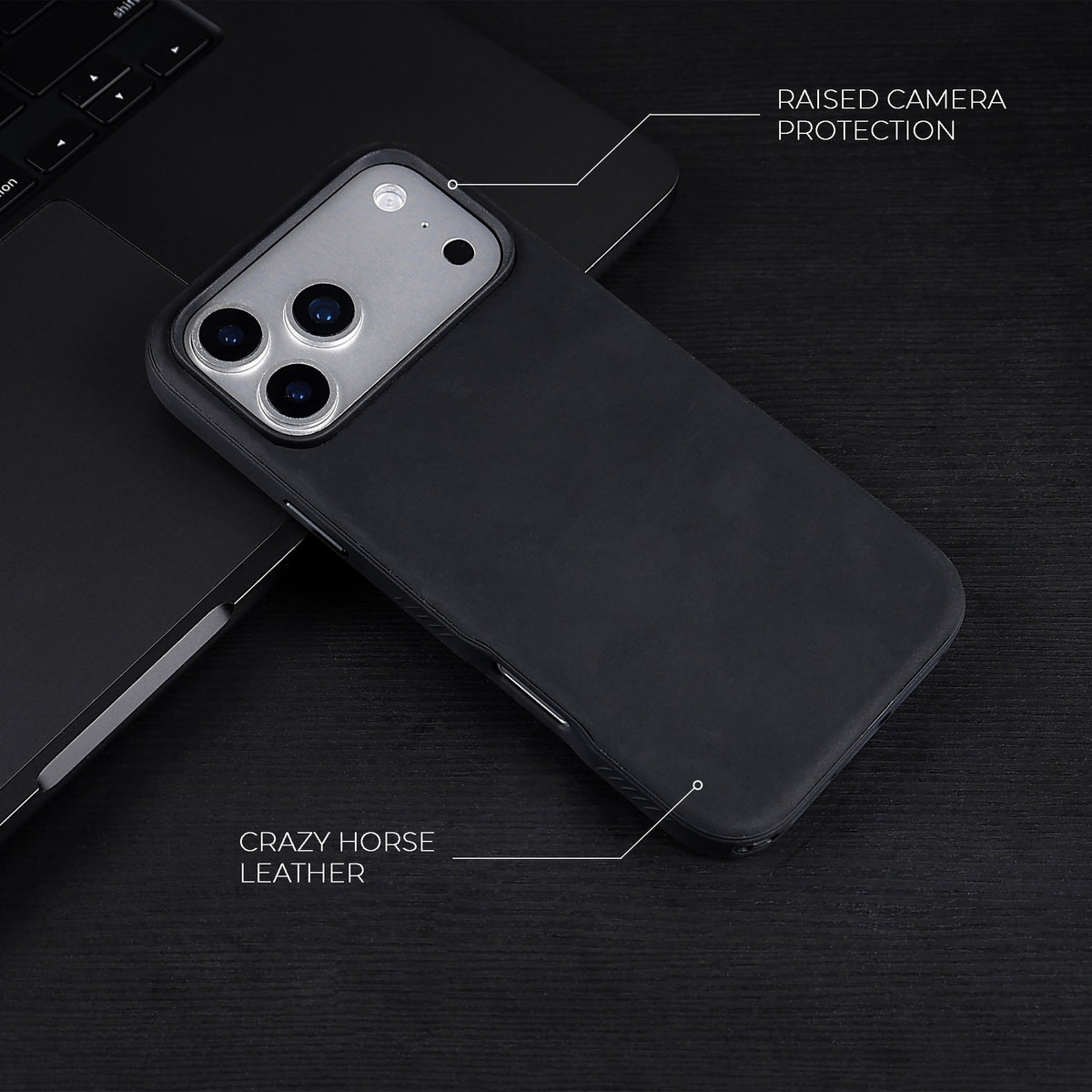 Black Crazy Horse hybrid leather cover for iPhone 17 Pro Max, 17 Pro, 18 Pro Max and 18 Pro, on a dark desk