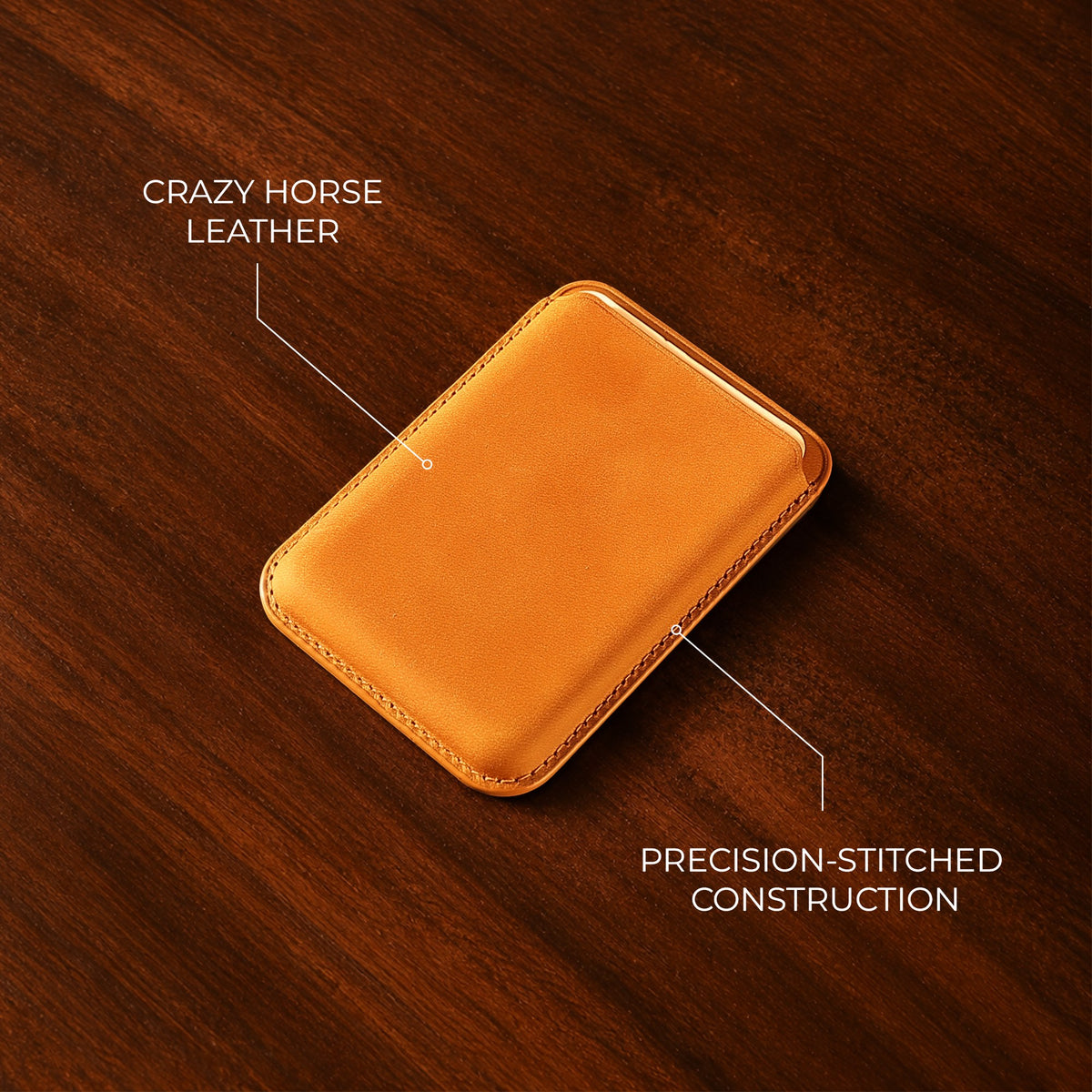 Tan Crazy Horse MagSafe leather wallet, on a wooden table